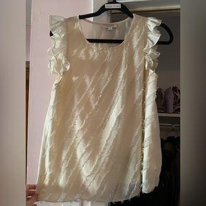 Textured cream flutter sleeve blouse.
